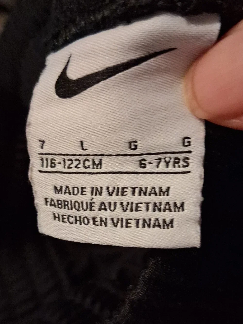 Nike Kids Black Leggings with White Swoosh Logo